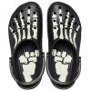 Saboți Crocs Pleasures x Classic „Skeleton – Glow in the Dark” 208267-001