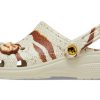 Saboți Crocs x Jurassic World Classic „Bone” 208860-2Y2