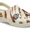 Saboți Crocs x Jurassic World Classic „Bone” 208860-2Y2